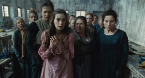 Fantine (ANNE HATHAWAY) is thrown out of the factory in "Les Misérables" ©Universal Studios.