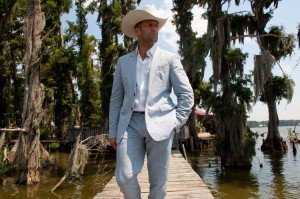 Jason Statham dons his cowboy hat in "Parker." ©Film District. CR:: Jack English.