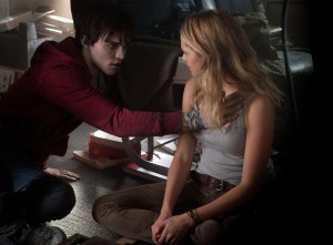 NICHOLAS HOULT feels the heartbeat of TERESA PALMER star in "WARM BODIES." ©Summit Entertainment. CR Jonathan Wenk.