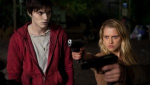 TERESA PALMER (r) fights off zombies as NICHOLAS HOULT looks on in "WARM BODIES." ©Summit Entertainment. CR: Jonathan Wenk.
