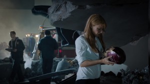 Pepper Potts (Gwyneth Paltrow) examines Iron Man's helmet in "Marvel's Iron Man 3" © 2012 MVLFFLLC.  TM & © 2012 Marvel. CR: Zade Rosenthal.