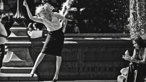Greta Gerwig dancing in front of fountain in "Frances Ha."  ©Pine District, LLC.