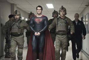 HENRY CAVILL (center) as Superman and CHRISTOPHER MELONI (far right) as Colonel Nathan Hardy in Warner Bros. Pictures’ and Legendary Pictures’ action adventure “MAN OF STEEL." ©DC Comics/Warner Bros. Entertainment. CR: Clay Enos.