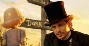 (l-r) China Girl (Joey King) begs Oz (James Franco) to go with him to kill a witch in "Oz The Great and Powerful." ©Disney.