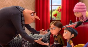 (L to R) Gru (STEVE CARELL) has a family meeting with Margo (MIRANDA COSGROVE), Edith (DANA GAIER) and Agnes (ELSIE FISHER) in "Despicable Me 2." ©Universal Studios.