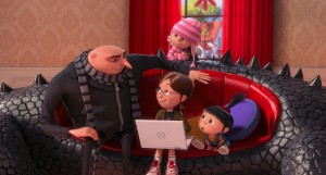 (L to R) Gru (STEVE CARELL) has a family meeting with Margo (MIRANDA COSGROVE), Edith (DANA GAIER) and Agnes (ELSIE FISHER) in "Despicable Me 2." ©Universal Studios.