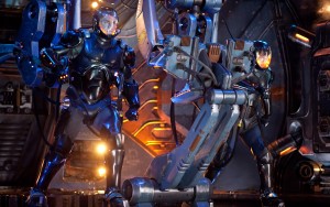 (l-r) Raleigh Beckett (Charlie Hunnam) and Mako Mori (Rino Kikuch) control their robot for battle in "Pacific Rim." ©Warner Bros. Entertainment/Legendary Pictures Funding. CR: Kerry Hayes.