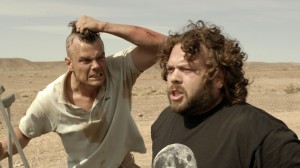 (L-R) Josh Duhamel can't keep his cool with Dan Fogler in the unique character-driven thriller “SCENIC ROUTE.” ©Vertical Entertainment.