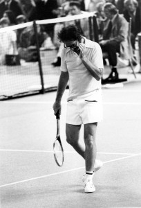Bobby Riggs walks off the court near the end of the third match in which Billie Jean King defeated the one-time champion of the courts to take the $100,000 winner-take-all tournament at the Houston Astrodome, Texas, on Sept. 20, 1973. King won 6-4, 6-3, 6-3. ©AP.