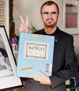 Ringo Starr takes a photograph with his book "Photograph, by Ringo Starr." - "Photograph, by Ringo Starr, the signed limited edition book of 2,500 copies from www.RingoPhotoBook.com, Tel: +44 (0)1483 540 970, Price $550"