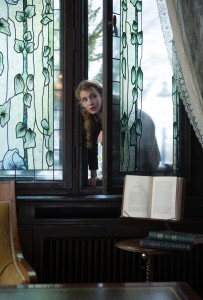 Liesel (Sophie Nélisse) sneaks into a neighbor’s well-stocked library to pursue her love of reading in "The Book Thief." ©20th Century Fox. CR: Jules Heath.