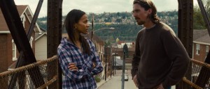 (Left to right.) Zoe Saldana and Christian Bale star in Relativity Media’s "Out of the Furnace." © 2012 Relativity Media. CR: Kerry Hayes.