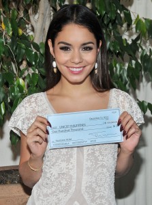 Vanessa Hudgens accepting on behalf of UNICEF Philippines, the $100,000 donation check by the Hollywood Foreign Press Association (HFPA) to help in the Typhoon Haiyan relief efforts held at the Hollywood Foreign Press Association in West Hollywood, CA. The event took place on Thursday, December 12, 2013. Photo by Sthanlee B. Mirador_GMA | Pacific Rim Photo Press.