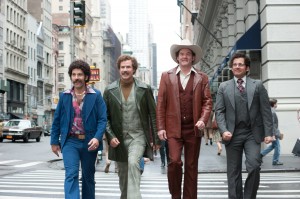 (Left to right) Paul Rudd is Brian Fantana, Will Ferrell is Ron Burgundy, David Koechner is Champ Kind and Steve Carell is Brick Tamland in ANCHORMAN 2: THE LEGEND CONTINUES. ©Paramount Pictures. CR: Gemma LaMana.