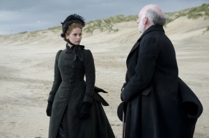 (l-r) Felicity Jones as Nelly Ternan and John Kavanagh as Reverend Benham in THE INVISIBLE WOMAN. ©Sony Pictures Classics. CR: David Appleby.