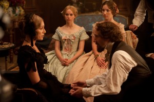 (l-r) Kristin Scott Thomas as Mrs. Ternan, Felicity Jones as Nelly Ternan, Perdita Weeks as Maria Ternan and Ralph Fiennes as Charles Dickens in THE INVISIBLE WOMAN. ©Sony Pictures Classics. CR: David Appleby.