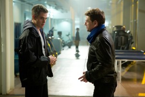 Left to right: Chris Pine (as Jack Ryan) discusses a scene with Director Kenneth Branagh on the set of JACK RYAN: SHADOW RECRUIT. ©Paramount Pictures. CR: Larry Horricks.