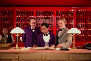(l-r) Tom Wilkinson, Tony Revolori and Owen Wilson in THE GRAND BUDAPEST HOTEL. ©20th Century Fox. CR: Martin Scali