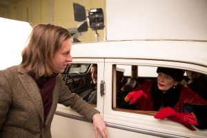 (l-) Director WES ANDERSON and TILDA SWINTON on the set of THE GRAND BUDAPEST HOTEL. ©20th Century Fox. CR: Martin Scali.