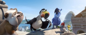 In Rio, (left to right) Luiz (Tracy Morgan), Rafael (George Lopez), Blu (Jesse Eisenberg), Pedro (will.i.am) and Nico (Jamie Foxx) discuss their plans for the future in the animated film "RIO 2," directed by Carlos Saldanha. ©20th Century Fox. CR: Blue Sky Studios.