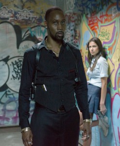 (Left to right.) RZA and Catalina Denis star in Relativity Media's BRICK MANSIONS. © 2013 EUROPACORP /TRANSFILM INTERNATIONAL INC. CR: Philippe Bosse’