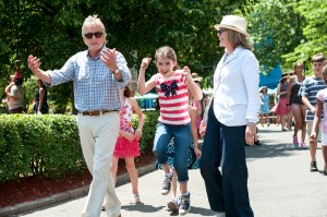 Oren (MICHAEL DOUGLAS), Sarah (STERLING JERINS) and Leah (DIANE KEATON) enjoy an afternoon at an amusement park in AND SO IT GOES. ©Clarius Entertainment. CR: Clay Enos.