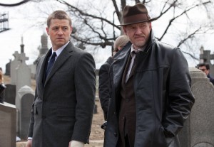 Detective James Gordon (Ben McKenzie, L) and Detective Harvey Bullock (Donal Logue, R) attend the Waynes' funeral in the Series Premiere of GOTHAM. ©Fox Broadcasting. CR: Jessica Miglio/Fox.