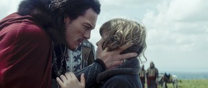 lad (LUKE EVANS) warns his son, Ingeras (ART PARKINSON), to run in "Dracula Untold", the origin story of the man who became Dracula. ©Universal Pictures.
