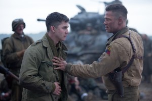 Wardaddy (Brad Pitt) with Norman (Logan Lerman) in Columbia Pictures' FURY. ©CTMG. CR: Giles Keyte.