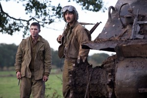 Norman (Logan Lerman) and Boyd "Bible" Swan in Columbia Pictures' FURY. ©CTMG. CR: Giles Keyte.