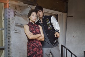 (l-r) Linda Wang and Harry Shum Jr. in "Revenge Of The Green Dragons." ©A24 Films.