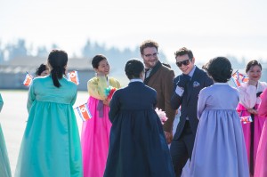 Aaron (Seth Rogen) and Dave (James Franco) arrive in North Korea to a welcoming crowd in Columbia Pictures' THE INTERVIEW. ©CTMG. C: Ed Araquel.