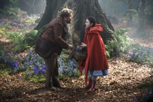 With James Corden as the baker and Lilla Crawford as Little Red Riding Hood, INTO THE WOODS. ©Disney Enterrpises. CR: Peter Mountain.