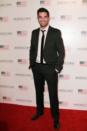 Producer Michael Masini arrives on the red carpet of the premiere of AMERICONS held at the Arclight Theaters in Hollywood, CA on Thursday, January 22, 2015. ©Theresa Bouche