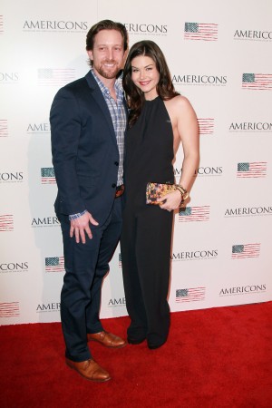 (L-R) Archstone Distribution Partner and Founder Scott Martin and wife Stephanie Beran arrives on the red carpet of the premiere of AMERICONS held at the Arclight Theaters in Hollywood, CA on Thursday, January 22, 2015. ©Theresa Bouche