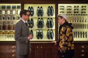 (l-r) Harry (Colin Firth), an impeccably suave spy, helps Eggsy (Taron Egerton) turn his life around by trying out for a position with Kingsman, a top-secret independent intelligence organization in KINGSMEN THE SECRET SERVICE. ©20th Century Fox. CR: Jaap Buitendijk.