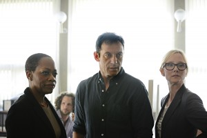(l-r) Regina Taylor as Ruth Ridell, Jason Isaacs as Peter Connelly, Anne Heche as Lynn Monahan in the USA Network show DIG. ©USA Network. CR: Ronen Akerman/USA Network.