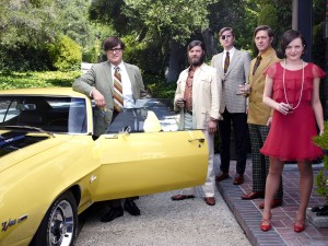 (L-R) Rich Sommer as Harry Crane, Jay R. Ferguson as Stan Rizzo, Aaron Stanton as Ken Cosgrove, Kevin Rahm as Ted Chaough and Elisabeth Moss as Peggy Olson star in MAD MEN. ©AMC. CR: Frank Ockenfels 3/AMC