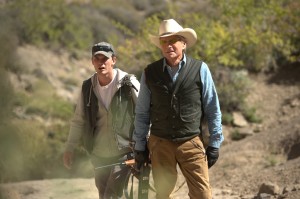 (l-r) Jeremy Irvine and Michael Douglas star in BEYOND THE REACH. ©Roadside Attractions. CR: Clay Enos.