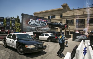 "Fast and Furious - Supercharged" event features an airborne car smashing into a billboard. ©Universal Studios. CR: David Sprague.