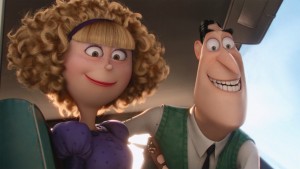 Madge Nelson (ALLISON JANNEY) and her husband, Walter (MICHAEL KEATON), are felons on the run in MINIONS. ©Universal Studios.