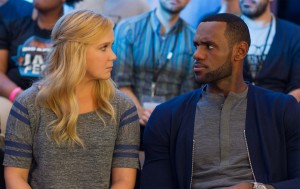 Amy (AMY SCHUMER) chats it up with LEBRON JAMES as himself in TRAINWRECK. ©Universal Studios. CR: Mary Cybulski.