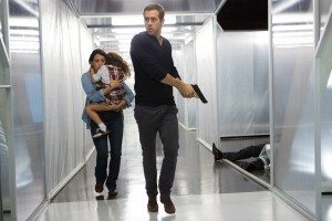 (l-r.) Madeline (Natalie Martinez) and daughter Anna (Jaynee-Lynne Kinchen) flee with Young Damian (Ryan Reynolds) in Gramercy Pictures' SELF/LESS. ©Gramercy Pictures. CR: Alan Markfield.