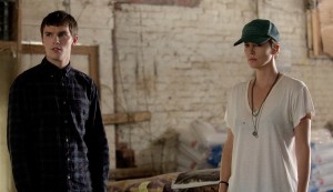 (l-r) Nicholas Hoult and Charlize Theron star in DARK PLACES. ©A24 Films. CR: Doane Gregory.