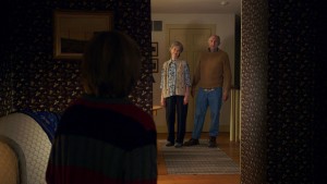 (L to R) Tyler (ED OXENBOULD) is terrified by Nana (DEANNA DUNAGAN) and Pop Pop (PETER MCROBBIE) in THE VISIT. ©Universal Studios.
