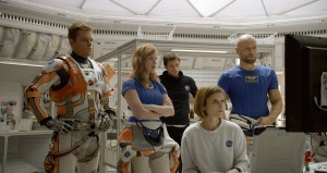 (from left) Matt Damon, Jessica Chastain, Sebastian Stan, Kate Mara, and Aksel Hennie portray the crewmembers of the fateful mission to Mars in THE MARTIAN. ©20th Century Fox.