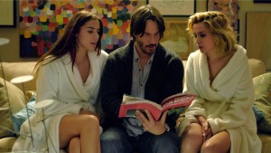 (l-r) Lorenza Izzo (Genesis), Keanu Reeves (Evan) and Ana De Armas (Bel) star in KNOCK KNOCK. ©Lionsgate Entertainment.