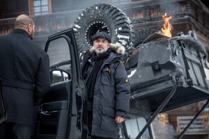 Sam Mendes (Director) and Dave Bautista (Hinx) discussing the scene by the crashed Range Rover between takes; Obertilliach, Austria on the set of Metro-Goldwyn-Mayer Pictures/Columbia Pictures/EON Productions’ action adventure SPECTRE. ©MGM Studios, Danjaq LLC and Columbia Pictures. CR: Jonathan Olley.