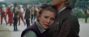 (l-r)  Leia (Carrie Fisher) and Han Solo (Harrison Ford) embrace in STAR WARS: THE FORCE AWAKENS. ©Lucasfilm Ltd. & TM. All Right Reserved.