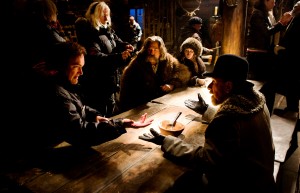 (L-R) QUENTIN TARANTINO directs KURT RUSSELL, JENNIFER JASON LEIGH, and TIM ROTH on the set of THE HATEFUL EIGHT. ©The Weinstein Company. CR: Andrew Cooper.